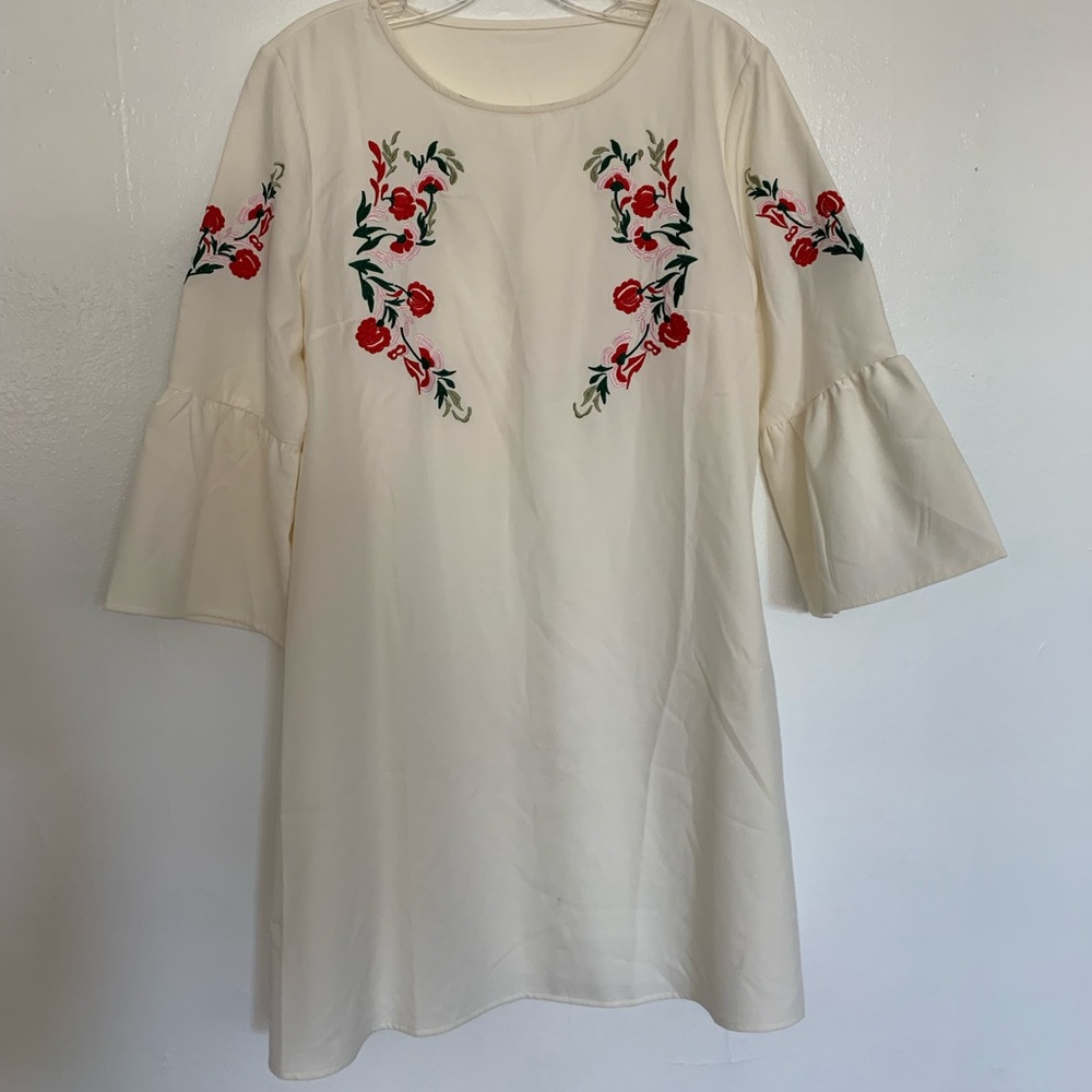 White bell sleeve dress with floral embroidery
